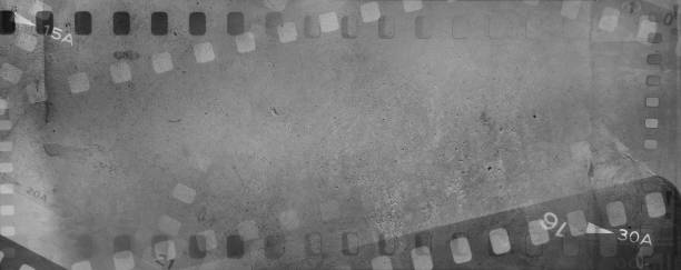 istock Film negatives grey background 2194063753