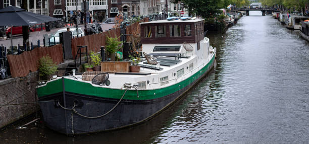 a canal on the inland waterways network of navigable canals and waterways in the english and british countryside in the uk, united kingdom, great britain, europe