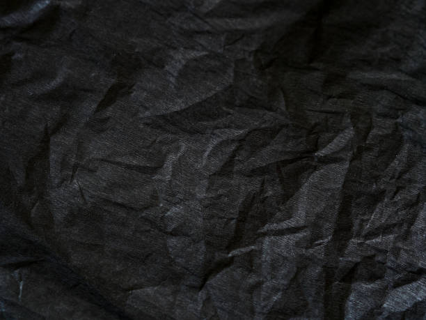 istock Black corrugated paper, natural texture with selective focus 2194067668