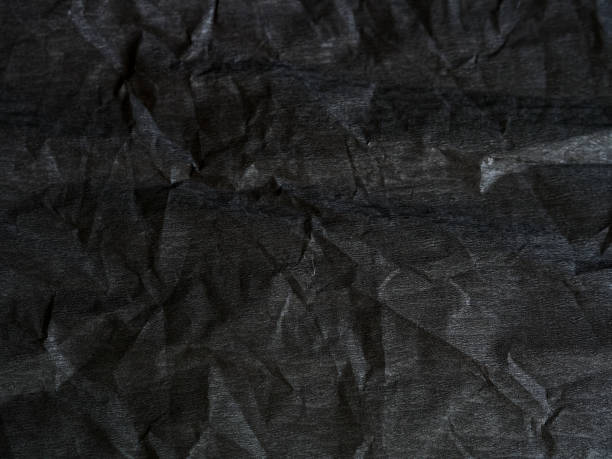 istock Black corrugated paper, natural texture with selective focus 2194067669
