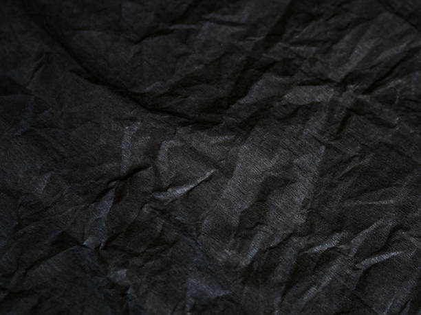 istock Black corrugated paper, natural texture with selective focus 2194067670