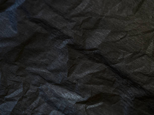 istock Black corrugated paper, natural texture with selective focus 2194067691