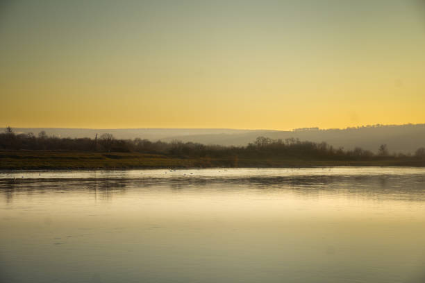 istock Golden Horizon Over the Water 2194068219