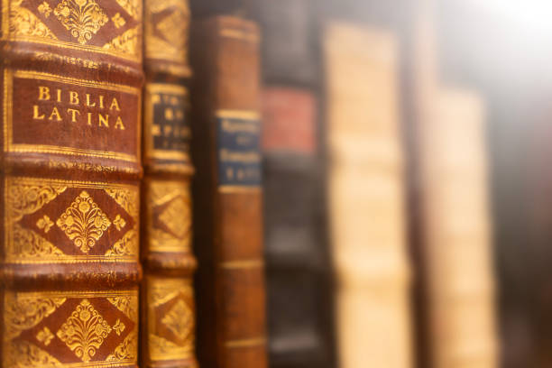 istock Decorative vintage bible book spines in soft focus lighting 2194069312