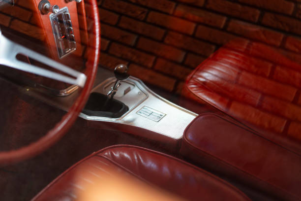 istock Interior of a vintage car with red leather seats 2194069896