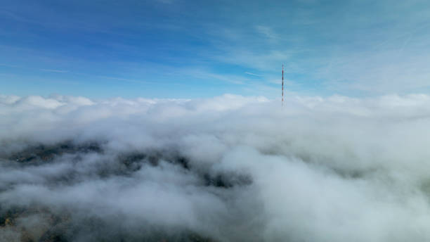 Fog and clouds over mountains and woodlands