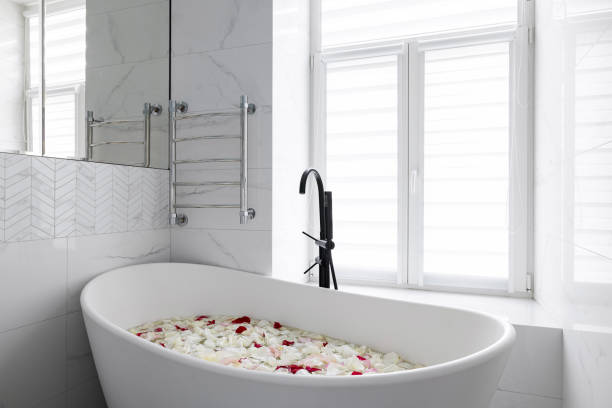 istock Experience the Luxurious Bath Embraced by Beautiful Rose Petals and Elegant Design Elements 2194074545