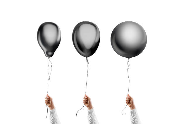 istock Hand holding blank black round, pear and sphere balloon mockup 2194075807