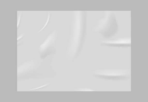 istock Smooth but slightly wrinkled white sheet of paper. 2194080641