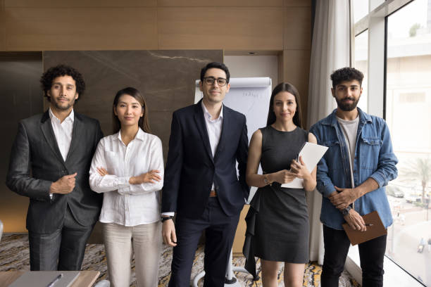 istock Portrait of five multinational businesspeople posing for camera in office 2194081424