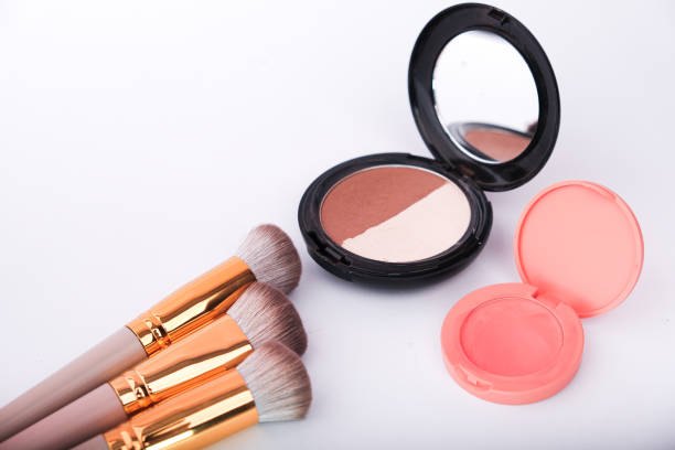 istock make - up products and brush make up on white background. 2194082136