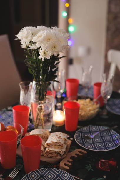 istock Enjoy a Festive Table Setting Complete with Beautiful Decor and Tasty Refreshments 2194082576