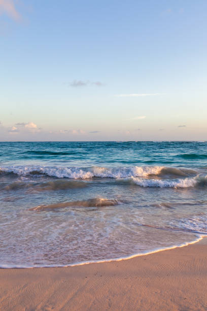 Clouds, sea, ocean, sand, water.