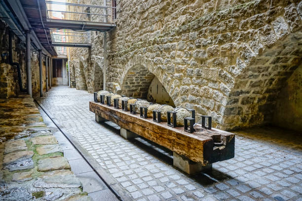 Old cannon balls displayed on a street in Pamplona
