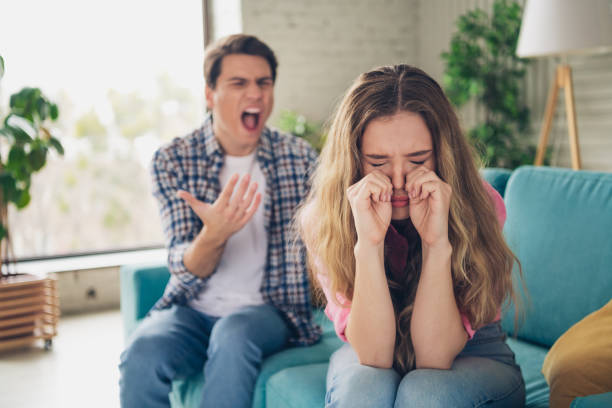 istock Distressed couple arguing in a cozy home interior with emotions running high 2194085110