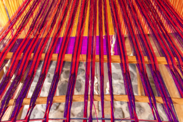 San Antonio Palopo, Solola, Guatemala. Colorful threads on a loom near Lake Atitlan.