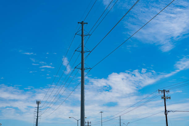 istock pylon producing energy. voltage transmission on electric tower. high voltage powerline. powerful substation. electricity provider. powering pylon utility. electricity power lines maintenance 2194099335