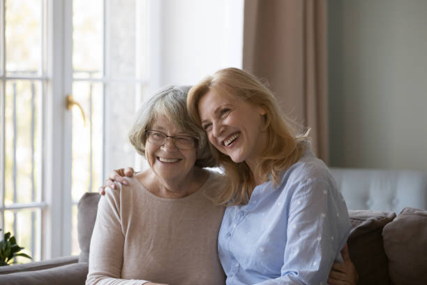 istock Happy older mother and caring middle aged daughter hugging 2194099732