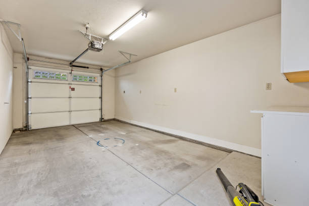 istock Spacious garage with wooden beams and ample storage options for various uses 2194110319