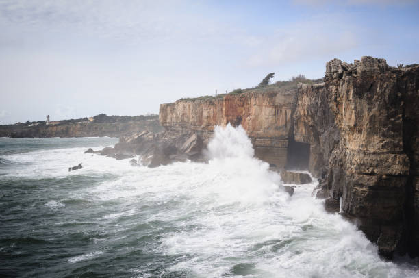 Waves Crashing Against Cliffs on a Rocky Coastline - Boca do Inferno in Cascais, Portugal
