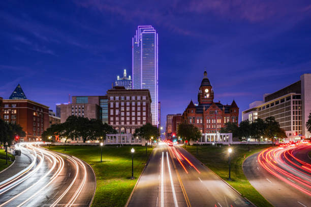 istock Car trails in downtown Dallas 2194111302