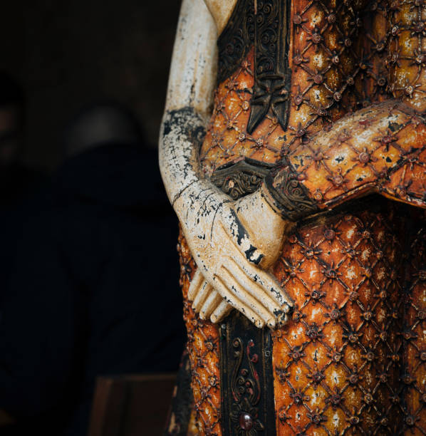 This close-up image captures the elegant details of a Thai Buddha statue, showcasing the delicate hand placement in a meditative gesture. The statue is adorned with an ornate, textured design, reflecting traditional Thai craftsmanship and cultural symbolism. The intricate patterns and the calm pose embody serenity and the rich artistic heritage of Thailand, offering a glimpse into its deep spiritual traditions.