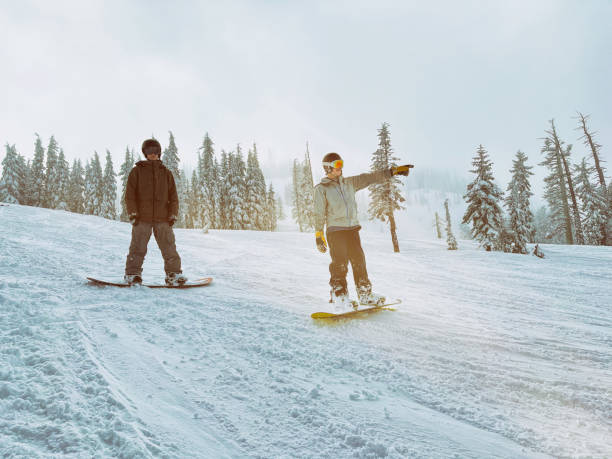 istock Teens snowboarding in Truckee 2194116858