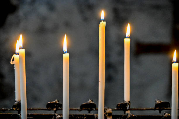 Candles burning in a cathedral in Venice