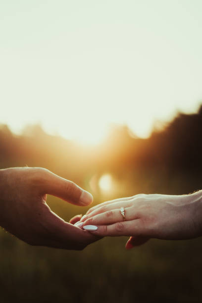istock Close Up Of Engaged Couple's Hands 2194127944