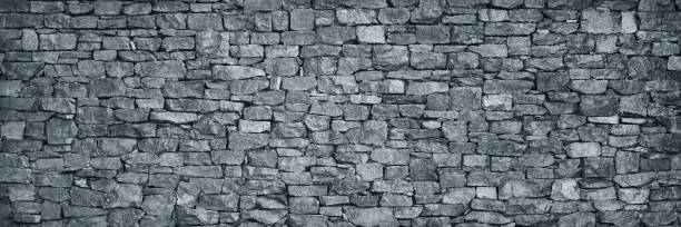 istock Light dusty silver grey blue white background. Stone wall surface texture. For design. Wide banner. 2194131538