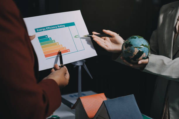 istock Carbon offset price report CO2 emission. Future growth Net zero waste in ESG ethical SME office protect climate change global warming social issues project. Group of asia people Eco friendly SDGs plan 2194133674