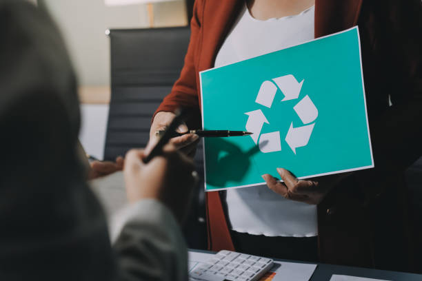 istock Carbon offset price report CO2 emission. Future growth Net zero waste in ESG ethical SME office protect climate change global warming social issues project. Group of asia people Eco friendly SDGs plan 2194133686