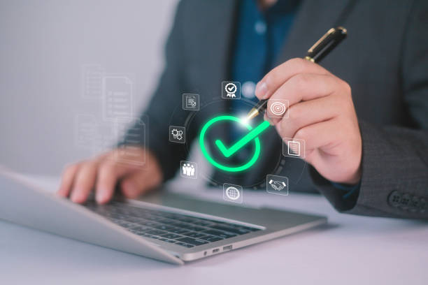 istock Business performance checklist concept, Take an assessment business man, Businessman using laptop an check survey filling form list options business employee security procedures. quality 2194134914