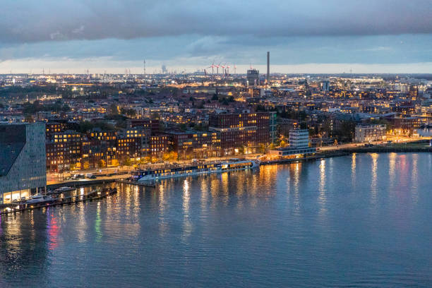 Nighttime cityscape near the central train station in Amsterdam, Netherlands