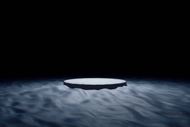 istock Black circle stone platform or podium on black sand dunes, spotlight pitch black background. light and shadow pedestal product display advertisement. Mysterious and scary. Copy space. 3D illustration. 2194141155