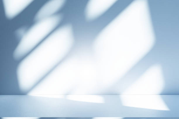 istock Studio style background wall decoration presentation uses white and blue tones. with shadows cast from a nearby window, concept creating a decorative 2194142450
