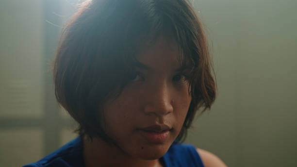 Portrait of boxer in locker room