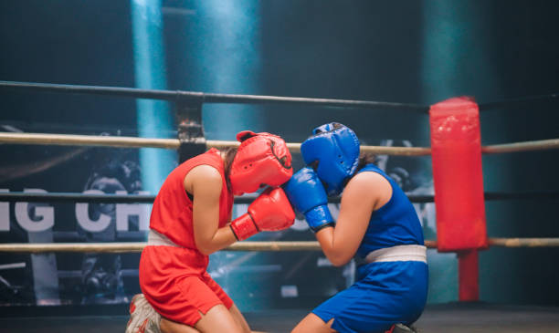istock Women boxer apologize together after boxing match 2194144075