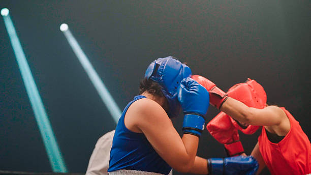 istock Two women boxer boxing on boxing ring 2194144164