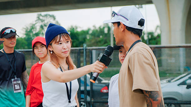 istock Reporter interview skater in skateboard competition 2194144882