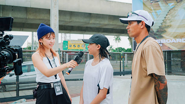 Reporter interview skater in skateboard competition