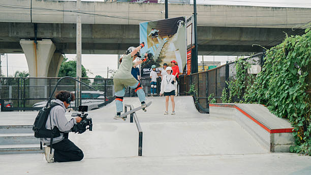 Asian skateboarder playing skate at skate park in skateboard competition