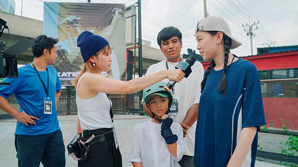 istock Reporter interview skater in skateboard competition 2194145025