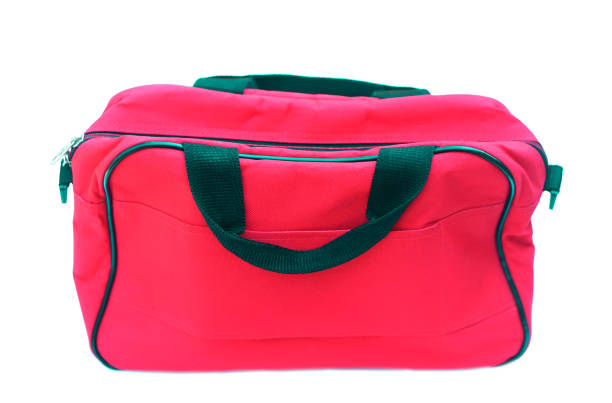 istock Red bag isolated on white background. Concept, equipment for containing things or cloth when traveling. Baggage or luggage using in daily life. 2194149120
