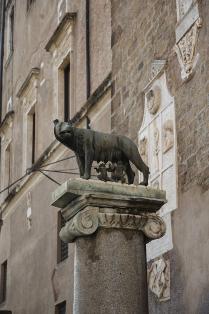 Lupa Senese, she wolf (female animal), symbol of the Siena, with Senio and Ascanio, sons of Remo, founders of the city. Piazza del Duomo, Siena downtown, Tuscany, Italy, Europe.