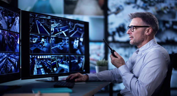 istock Male Security Guard Talking On Walkie-talkie 2194154900