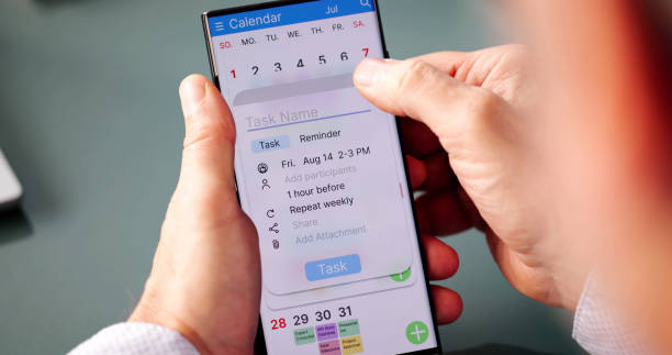 istock Calendar Sheet And Reminder On Phone 2194154949