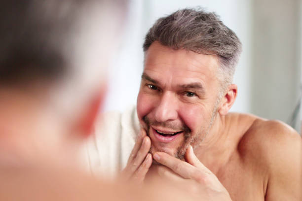istock Close-up Of A Man Washing Face 2194155372