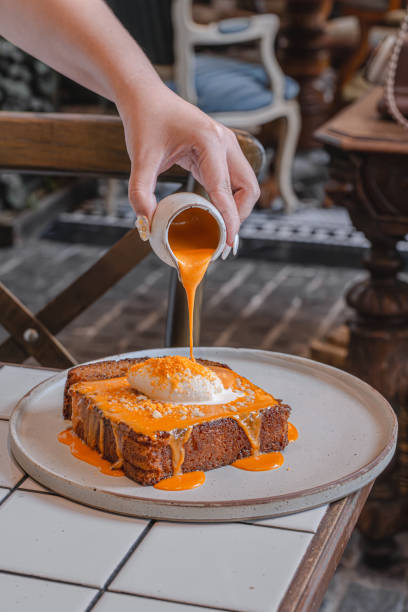 istock Pumpkin Bread Drizzled with Decadent Dessert Sauce 2194155571
