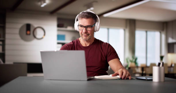 istock College Teacher At Home Using Laptop 2194155893